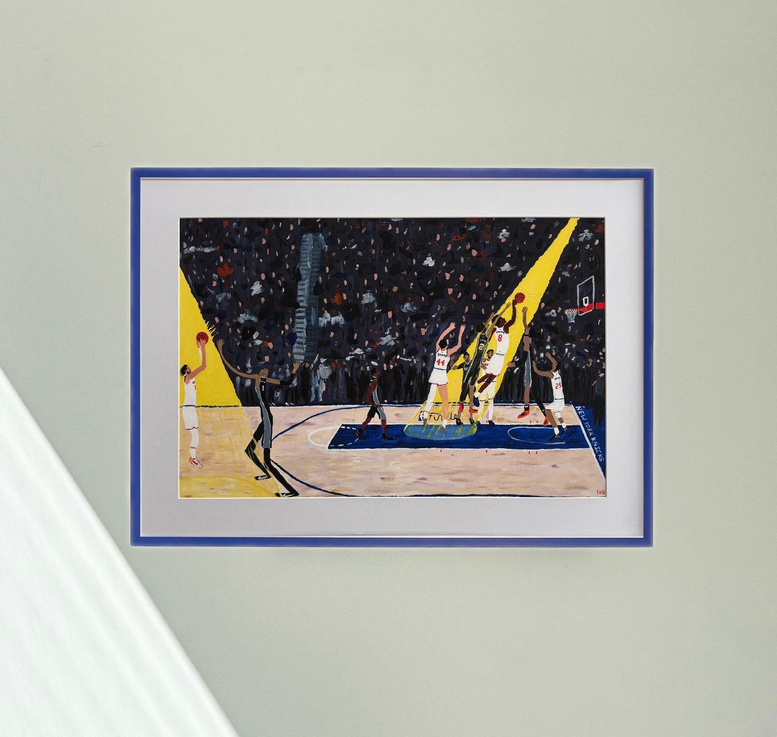“IT’S GOOD! IT’S GOOD! IT’S GOOD!” print in a blue frame with a white mat on a pale gallery wall